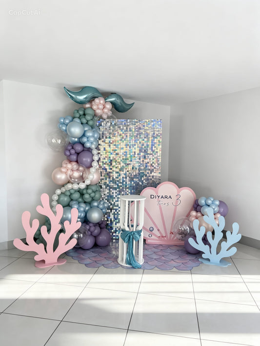 mermaid 3rd birthday balloon backdrop with shimmer wall and tail garland
