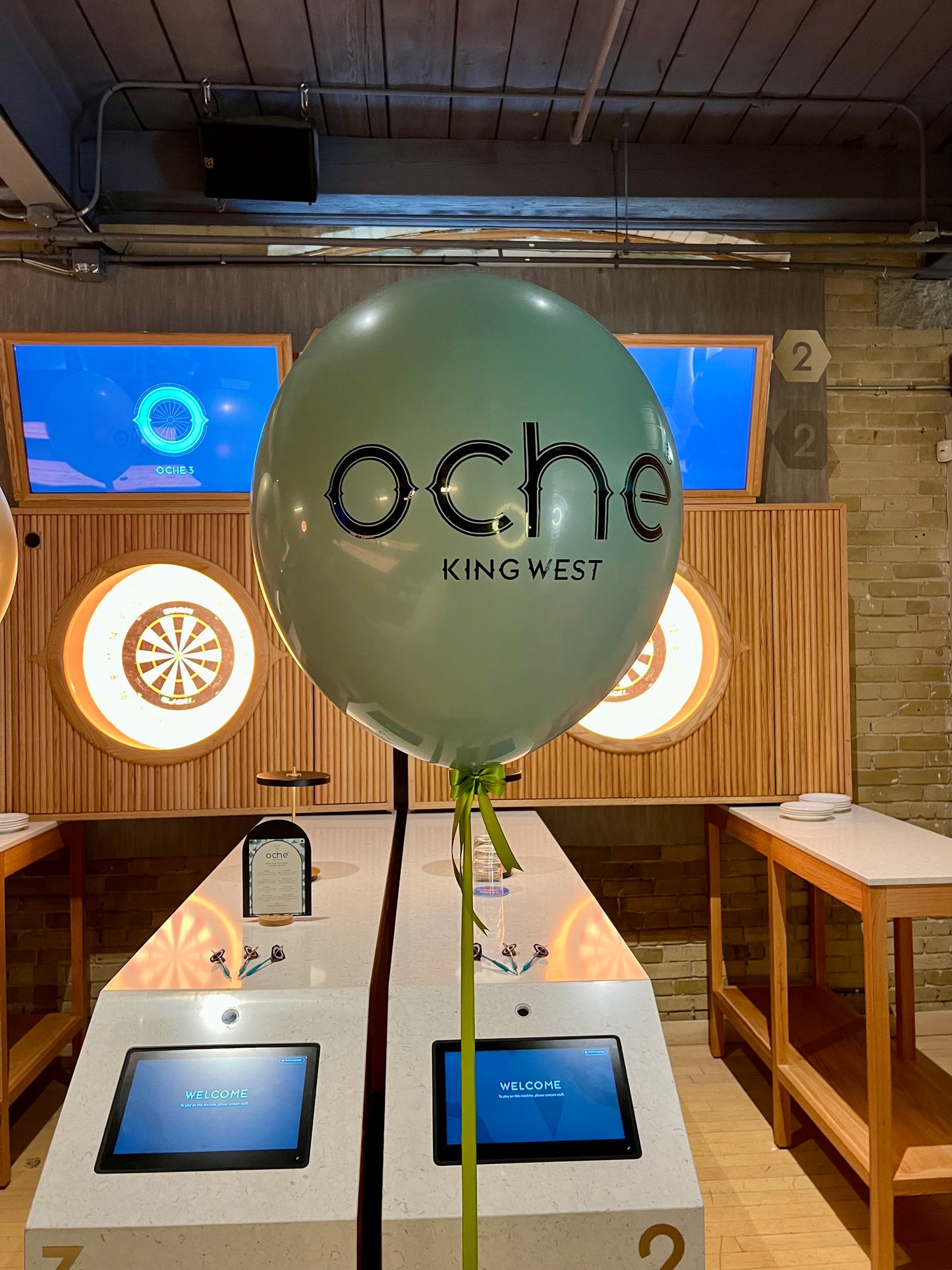 24-inch branded helium balloon with custom logo and ribbon