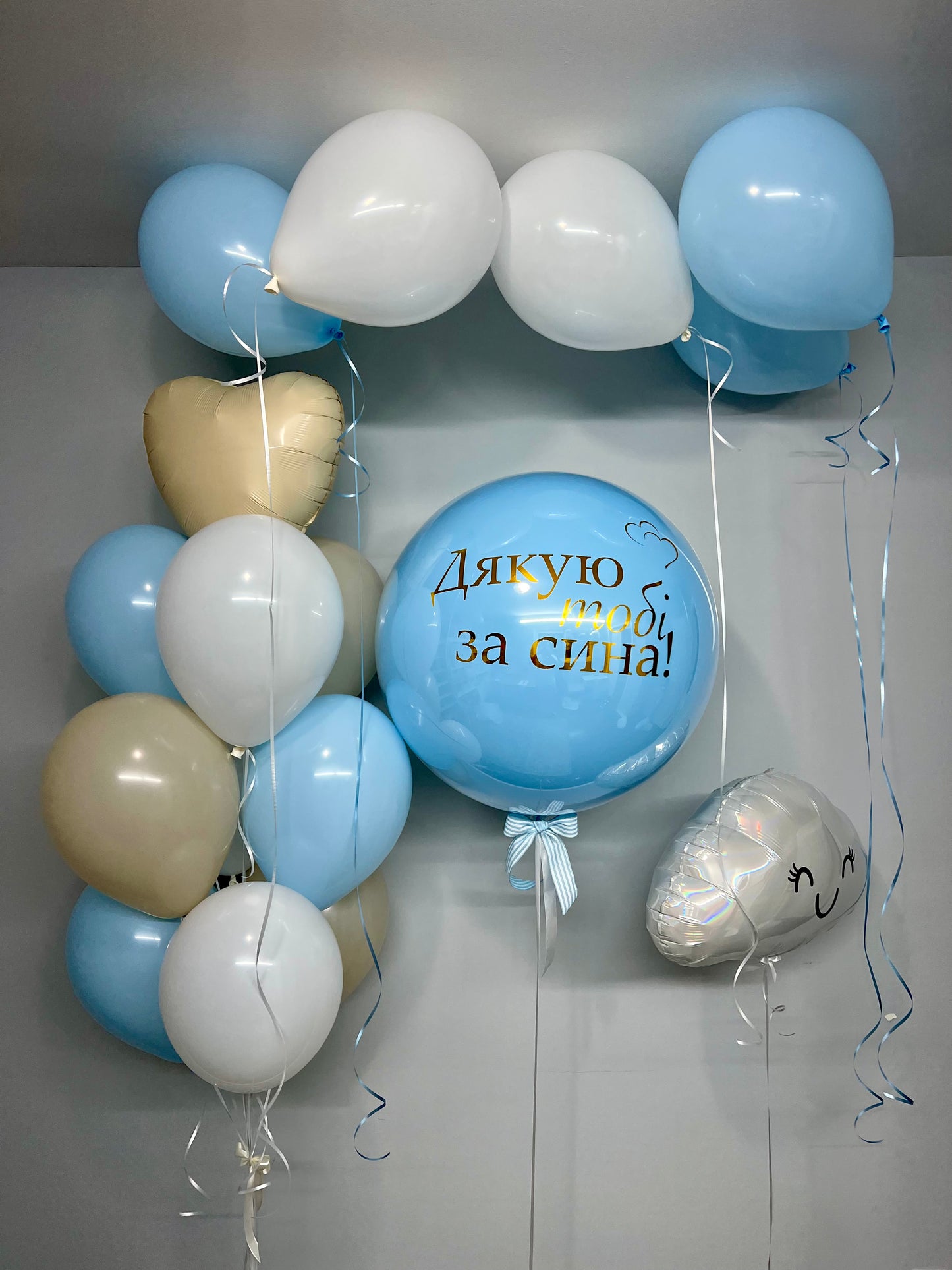 welcome home baby boy balloon set with blue ceiling balloons and custom bubble balloon