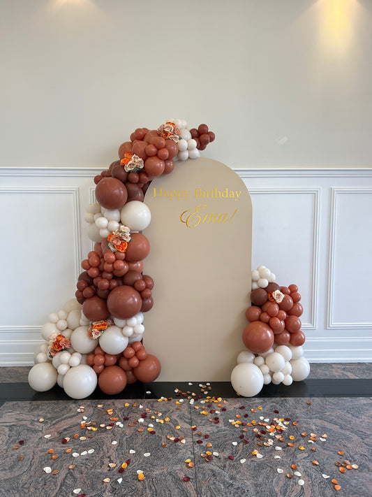 autumn balloon backdrop with terracotta garlands and floral accents
