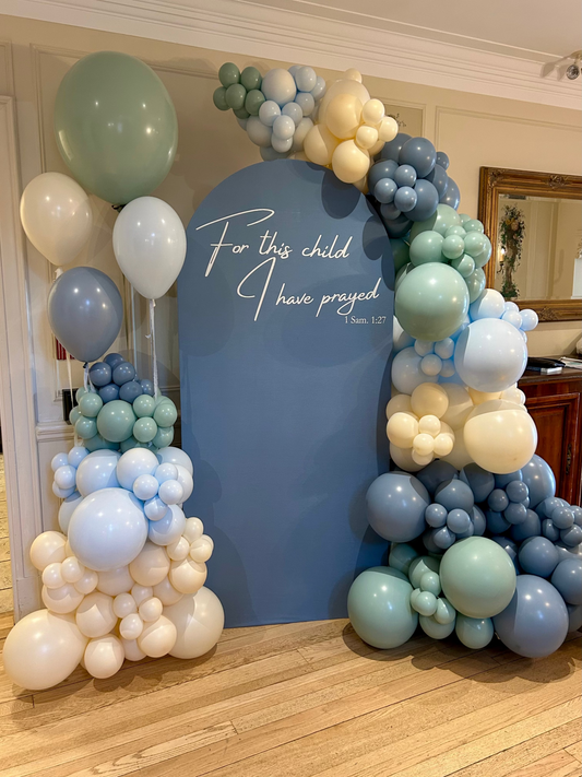 Baby Shower setup with blue Full Arch backdrop, two balloon garlands and helium balloon arrangement