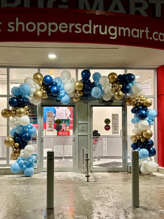 double entrance balloon arch setup for store opening event
