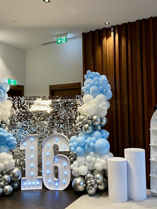 Silver Shimmer Wall Birthday Setup with Neon & Balloon Garlands