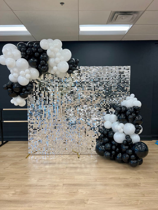 7×8 shimmer wall backdrop with black and white balloon garlands, customisable colours, and optional event props