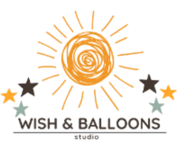 Logo of Wish & Balloons studio with a sun and stars design on a white background