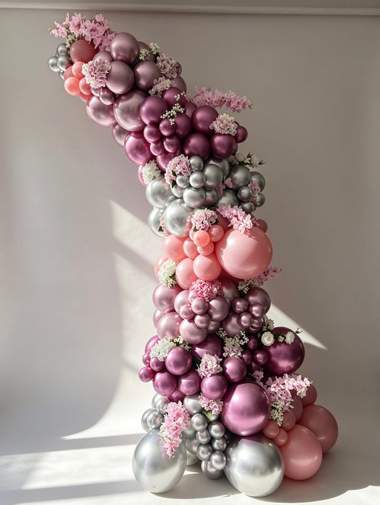 luxury blush and chrome balloon garland with floral accents