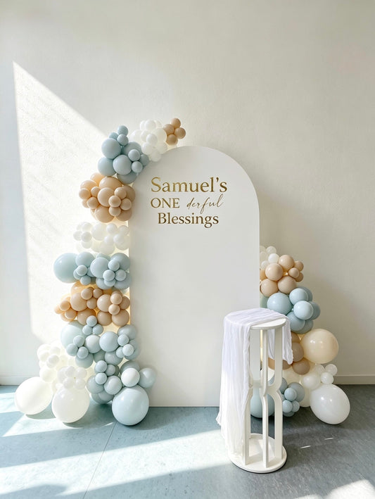 First birthday balloon backdrop with sage, beige and white balloon garlands