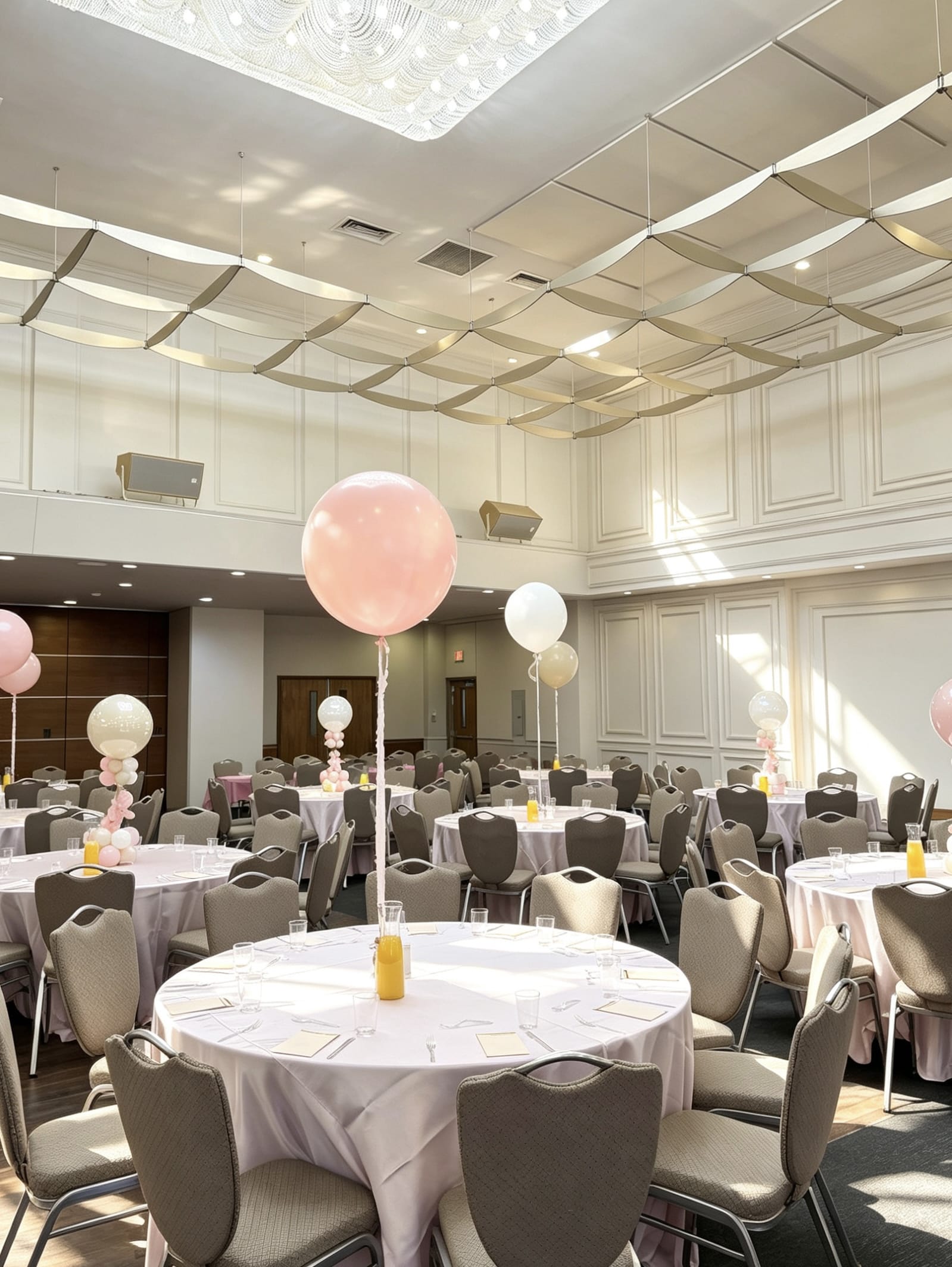 24-inch jumbo helium balloon table centerpiece with coordinating latex balloons and decorative ribbon for elegant event tables.