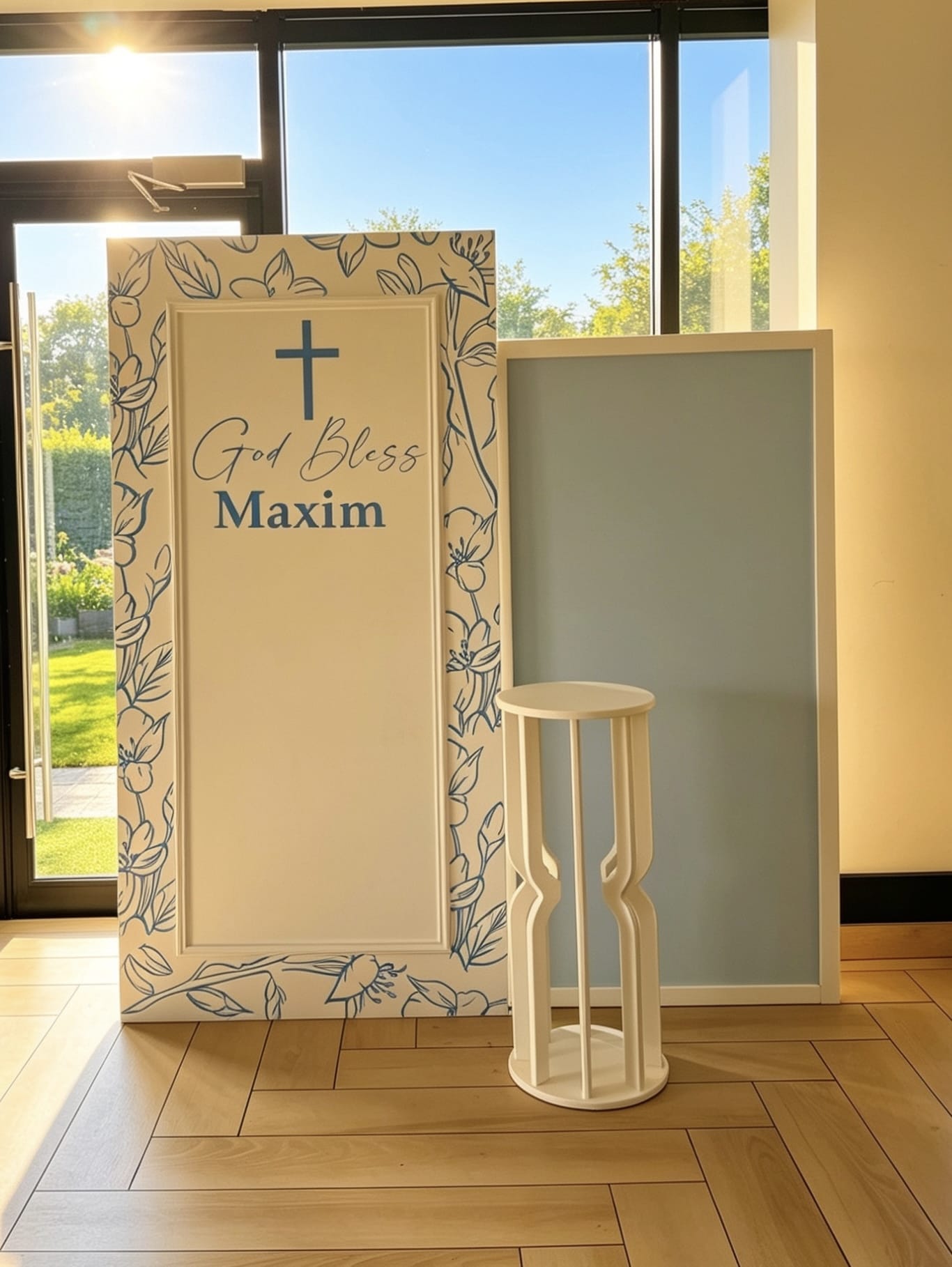  Classic blue baptism backdrop with personalized white backdrop, soft blue panel, custom name sign and white cake pedestal.