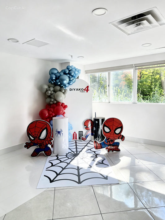 spiderman 4th birthday balloon backdrop with red blue garland and character cutouts
