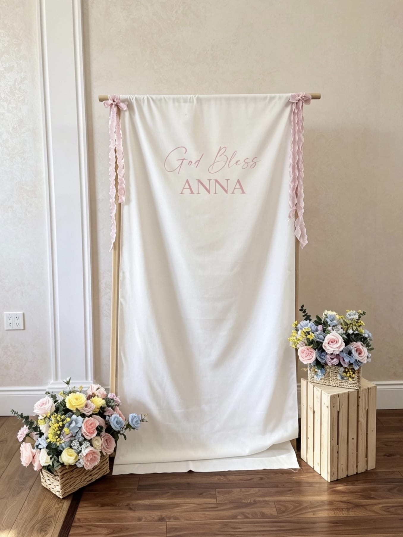 Fabric communion banner backdrop with pastel floral arrangements and wooden display stand